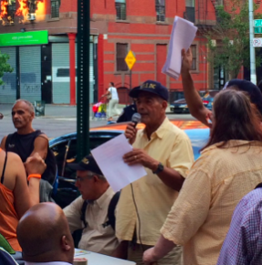 Photo // Charlotte Gibson Robert Anazagasti calls on the community of East Harlem to fight back against developers. 